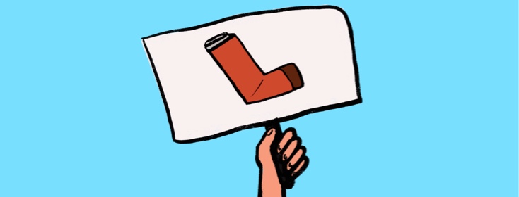 A hand holding up a sign with a picture of a red inhaler.