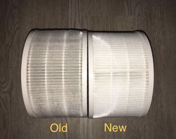 the old air filter that is full of dust and next to the noticeably cleaner new filter
