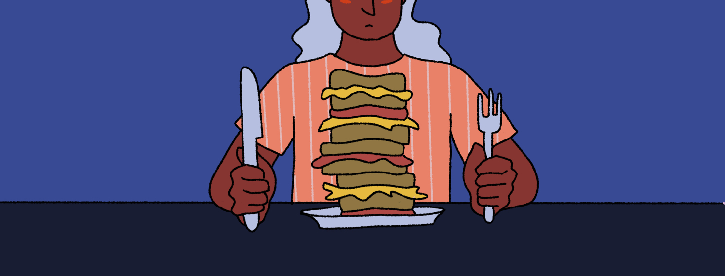 A woman looking down worriedly at a huge plate of food