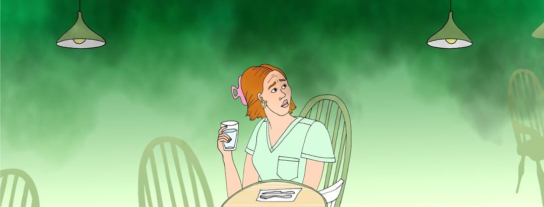 A woman sits alone in a smokey BBQ restaurant.